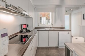 Microwave, oven, coffee/tea maker, high chair