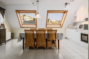 Fridge, oven, coffee/tea maker, dining tables