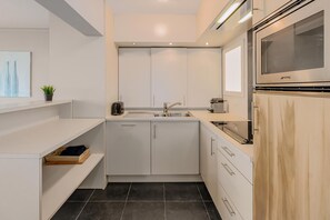 Frigorifero, microonde, macchina per tè/caffè