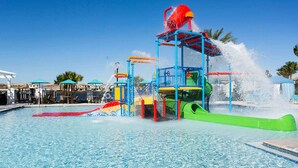 A water park with a pool, slides, and a water play area. - Upstay - 20 Guest Mansion w THE Best Amenities (Kissimmee)