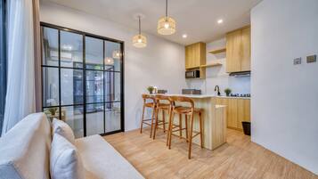 Premium Suite, 1 Bedroom, Balcony, Ground Floor | Living area