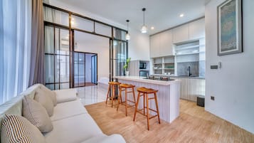 Premium Suite, 1 Bedroom, Balcony, Ground Floor | Living area