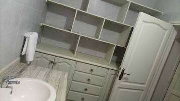 Shower, jetted bath, soap, toilet paper