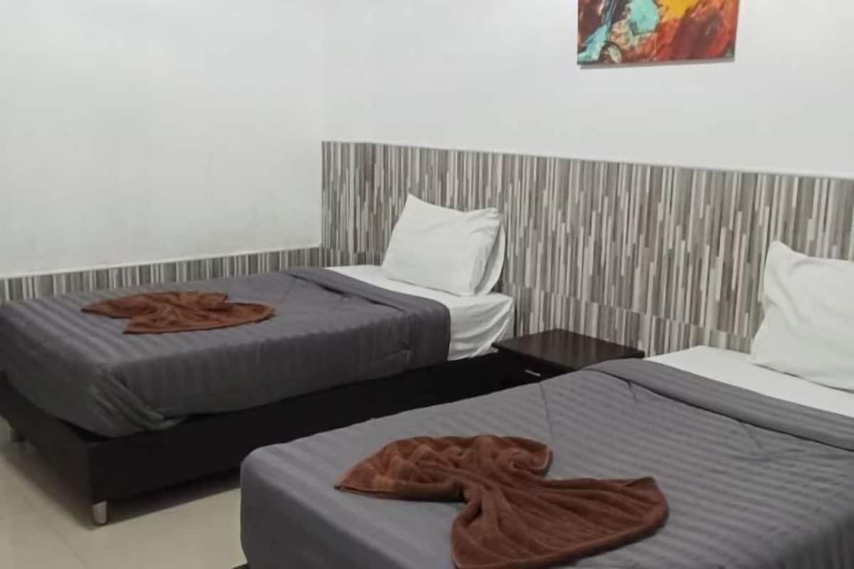Desk, blackout drapes, WiFi (free), bed sheets