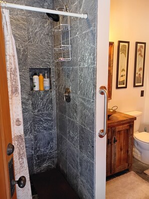 Shower, hair dryer, towels, soap