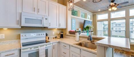 Fridge, microwave, stovetop, coffee/tea maker