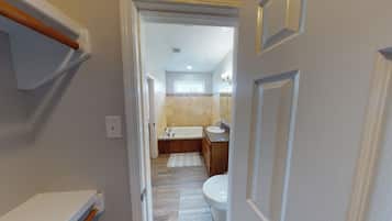 Jetted bath, hair dryer, towels, soap