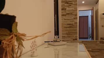 Deluxe Apartment, Balcony, City View | Living area | Flat-screen TV