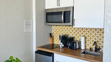 Fridge, microwave, stovetop, coffee/tea maker