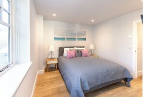 Appartement Deluxe | Rideaux d’obscurcissement, fer et planche à repasser