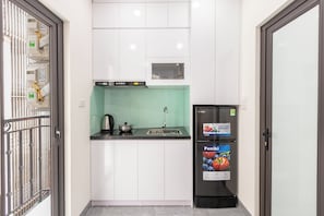 King Suite | Bếp riêng | Tủ lạnh, sản phẩm vệ sinh thân thiện với môi trường, tủ đông, khăn giấy