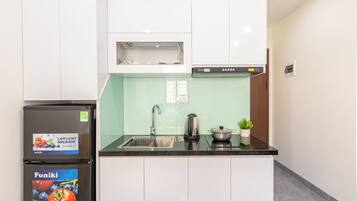 Deluxe Studio | Desk, laptop workspace, blackout drapes, iron/ironing board