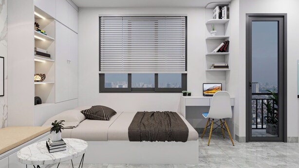 Un dormitorio moderno con una cama, un escritorio y un balcón.