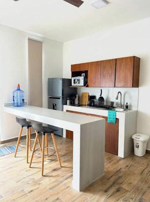 Microwave, stovetop, coffee/tea maker, toaster