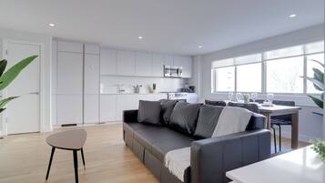 Apartment | Living area | 40-inch Smart TV with cable channels