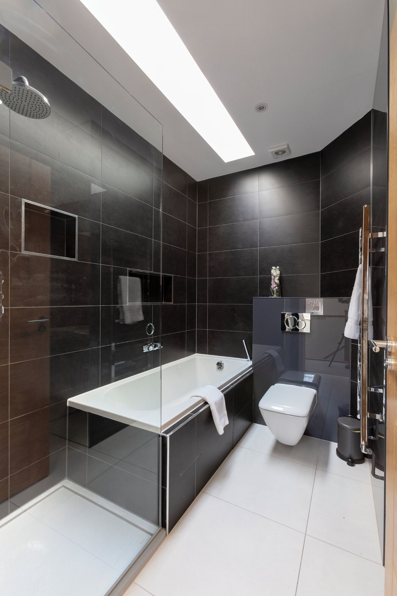 Separate bathtub and shower, hair dryer, heated floors, towels