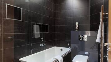 Separate bathtub and shower, hair dryer, heated floors, towels