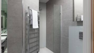 Separate bathtub and shower, hair dryer, heated floors, towels