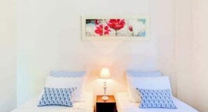 2 habitaciones, tabla de planchar con plancha, wifi y ropa de cama 