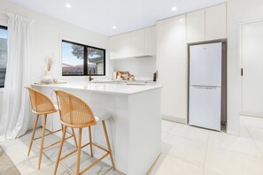 Fridge, dishwasher, coffee/tea maker, toaster