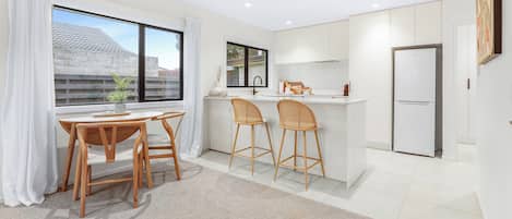 Fridge, microwave, dishwasher, coffee/tea maker