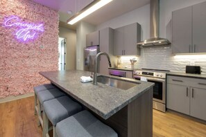 Fridge, microwave, oven, stovetop - Cowgirl Up! - 4BD/4.5BTH - Rooftop Views (Nashville)
