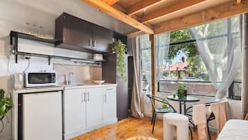 Family Studio Suite, Berbilang Katil, Kitchen, Mezzanine | Ruang tamu