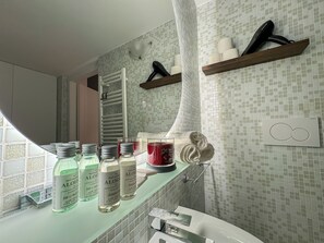 Hair dryer, bidet, towels, soap