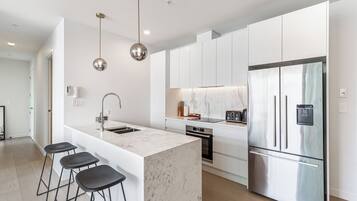 Apartment | Private kitchen | Fridge, stovetop, dishwasher, cookware/dishes/utensils