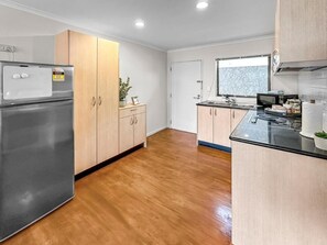 Apartment | Private kitchen - 2BR Newmarket Retreat near Broadway: Zodiak Stays (Auckland)