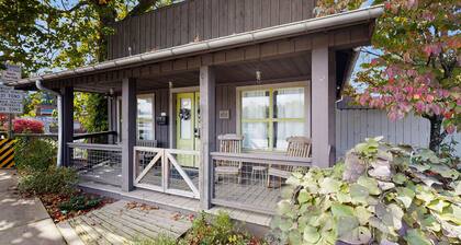 Historic 2 bedroom home with wood-burning fireplace and river front views