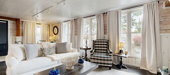 Historic 2 bedroom home with wood-burning fireplace and river front views