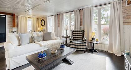 Historic 2 bedroom home with wood-burning fireplace and river front views