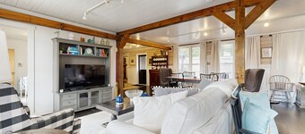 Historic 2 bedroom home with wood-burning fireplace and river front views