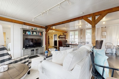 Historic 2 bedroom home with wood-burning fireplace and river front views