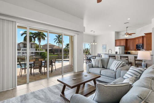 NEW EVERYTHING!!  4-bed 3 bath South Facing spill over spa pool.  2 king suites