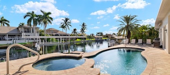 NEW EVERYTHING!!  4-bed 3 bath South Facing spill over spa pool.  2 king suites