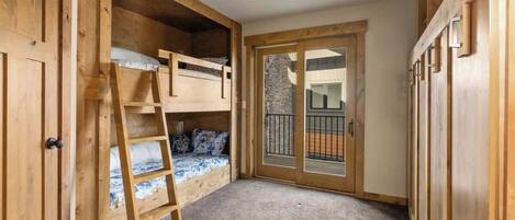 2 bedrooms, desk, iron/ironing board, travel crib