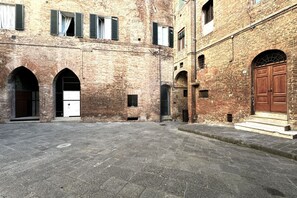 Exterior - The small square of the Castellare (Siena)