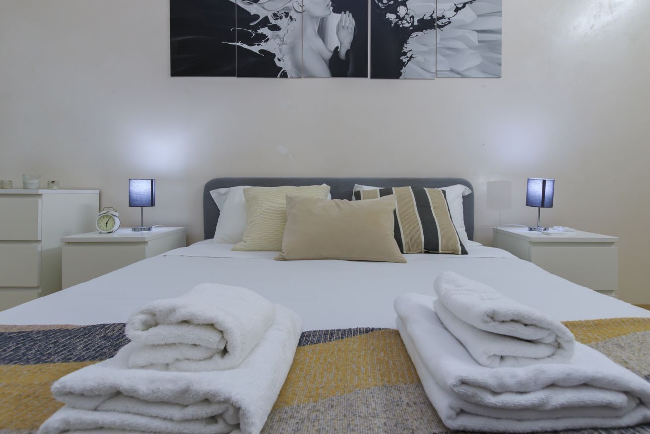 1 bedroom, desk, iron/ironing board, travel crib