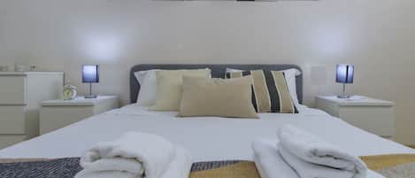 1 bedroom, desk, iron/ironing board, travel crib