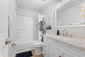 Hair dryer, towels, soap, shampoo