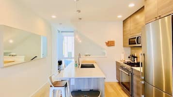 Comfort Townhome, City View | Private kitchen | Coffee/tea maker