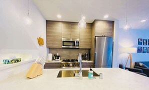 Comfort Townhome, City View | Private kitchen | Coffee/tea maker