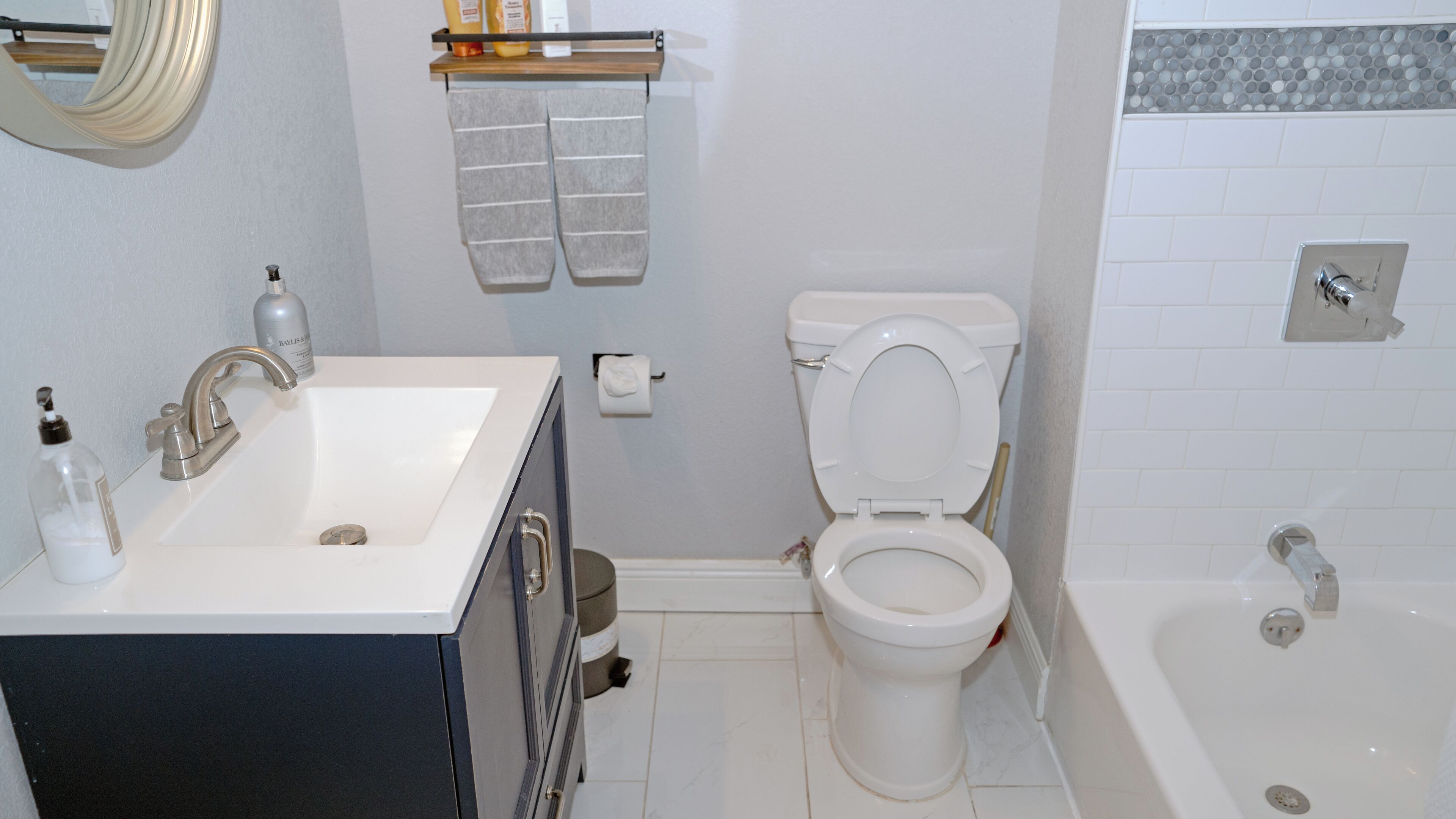 Hair dryer, towels, soap, toilet paper