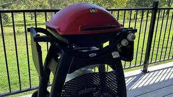 Enjoy outdoor cooking on the deck with a portable grill and take in the surrounding landscape.