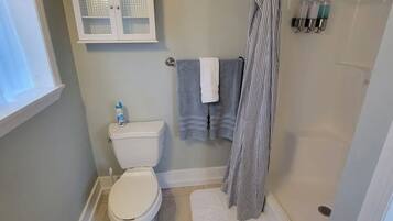 Hair dryer, towels, soap, toilet paper