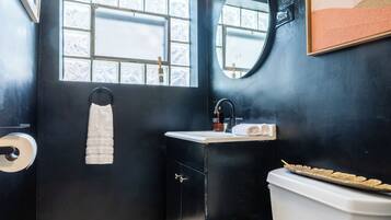 Eco-friendly toiletries, hair dryer, bidet, towels