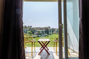 Deluxe Suite, City View | Desk, laptop workspace, soundproofing, iron/ironing board