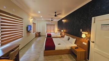 Quadruple Room, Garden View | Desk, laptop workspace, soundproofing, iron/ironing board